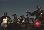 Image of men on jeep Mariana Islands, 1945, second 8 stock footage video 65675067214