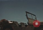 Image of men on jeep Mariana Islands, 1945, second 12 stock footage video 65675067214