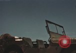 Image of men on jeep Mariana Islands, 1945, second 14 stock footage video 65675067214