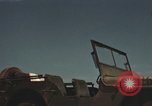 Image of men on jeep Mariana Islands, 1945, second 15 stock footage video 65675067214