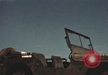 Image of men on jeep Mariana Islands, 1945, second 16 stock footage video 65675067214