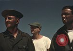 Image of men on jeep Mariana Islands, 1945, second 20 stock footage video 65675067214