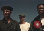 Image of men on jeep Mariana Islands, 1945, second 21 stock footage video 65675067214