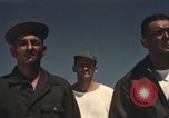 Image of men on jeep Mariana Islands, 1945, second 22 stock footage video 65675067214