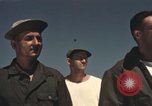 Image of men on jeep Mariana Islands, 1945, second 24 stock footage video 65675067214