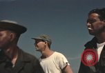 Image of men on jeep Mariana Islands, 1945, second 25 stock footage video 65675067214
