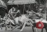 Image of bronco busting Coral Gables Florida USA, 1935, second 33 stock footage video 65675067261