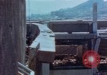 Standbild physische Schäden Nagasaki Japan, 1945, aus Sekunde 29 historischem Filmmaterial Videoclip 65675067331