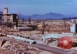 Image Relevé des dommages physiques couleur à Hiroshima Hiroshima au Japon, 1946, de la seconde 46 séquences d'archives historiques vidéo 65675067350