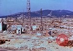 Image Relevé des dommages physiques couleur à Hiroshima Hiroshima au Japon, 1946, de la seconde 61 séquences d'archives historiques vidéo 65675067350