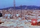 Image Relevé des dommages physiques couleur à Hiroshima Hiroshima au Japon, 1946, de la seconde 62 séquences d'archives historiques vidéo 65675067350
