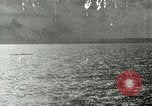 Image of US Navy aircraft bombing island Saipan Northern Mariana Islands, 1944, second 1 stock footage video 65675067413