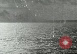Image of US Navy aircraft bombing island Saipan Northern Mariana Islands, 1944, second 3 stock footage video 65675067413