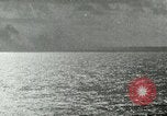 Image of US Navy aircraft bombing island Saipan Northern Mariana Islands, 1944, second 4 stock footage video 65675067413