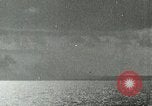 Image of US Navy aircraft bombing island Saipan Northern Mariana Islands, 1944, second 5 stock footage video 65675067413