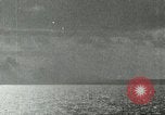 Image of US Navy aircraft bombing island Saipan Northern Mariana Islands, 1944, second 6 stock footage video 65675067413