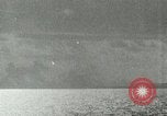 Image of US Navy aircraft bombing island Saipan Northern Mariana Islands, 1944, second 8 stock footage video 65675067413
