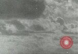 Image of US Navy aircraft bombing island Saipan Northern Mariana Islands, 1944, second 17 stock footage video 65675067413