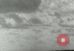 Image of US Navy aircraft bombing island Saipan Northern Mariana Islands, 1944, second 23 stock footage video 65675067413