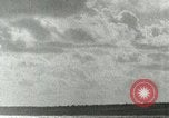 Image of US Navy aircraft bombing island Saipan Northern Mariana Islands, 1944, second 25 stock footage video 65675067413