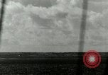 Image of US Navy aircraft bombing island Saipan Northern Mariana Islands, 1944, second 27 stock footage video 65675067413