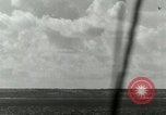 Image of US Navy aircraft bombing island Saipan Northern Mariana Islands, 1944, second 30 stock footage video 65675067413