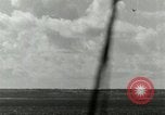 Image of US Navy aircraft bombing island Saipan Northern Mariana Islands, 1944, second 31 stock footage video 65675067413