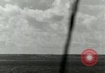 Image of US Navy aircraft bombing island Saipan Northern Mariana Islands, 1944, second 34 stock footage video 65675067413