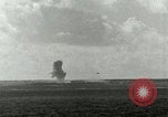 Image of US Navy aircraft bombing island Saipan Northern Mariana Islands, 1944, second 45 stock footage video 65675067413