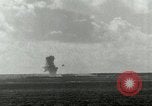 Image of US Navy aircraft bombing island Saipan Northern Mariana Islands, 1944, second 46 stock footage video 65675067413