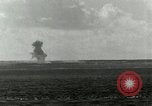 Image of US Navy aircraft bombing island Saipan Northern Mariana Islands, 1944, second 50 stock footage video 65675067413