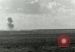 Image of US Navy aircraft bombing island Saipan Northern Mariana Islands, 1944, second 51 stock footage video 65675067413