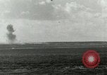 Image of US Navy aircraft bombing island Saipan Northern Mariana Islands, 1944, second 52 stock footage video 65675067413
