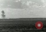 Image of US Navy aircraft bombing island Saipan Northern Mariana Islands, 1944, second 53 stock footage video 65675067413