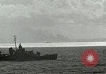 Image of US Navy aircraft bombing island Saipan Northern Mariana Islands, 1944, second 57 stock footage video 65675067413