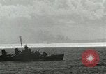 Image of US Navy aircraft bombing island Saipan Northern Mariana Islands, 1944, second 58 stock footage video 65675067413