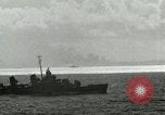 Image of US Navy aircraft bombing island Saipan Northern Mariana Islands, 1944, second 59 stock footage video 65675067413