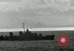 Image of US Navy aircraft bombing island Saipan Northern Mariana Islands, 1944, second 61 stock footage video 65675067413