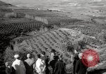 Image of Guide with visitors at a farm Morocco North Africa, 1942, second 16 stock footage video 65675067421
