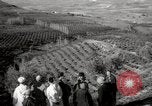 Image of Guide with visitors at a farm Morocco North Africa, 1942, second 20 stock footage video 65675067421