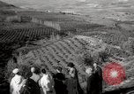 Image of Guide with visitors at a farm Morocco North Africa, 1942, second 21 stock footage video 65675067421