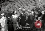 Image of Guide with visitors at a farm Morocco North Africa, 1942, second 26 stock footage video 65675067421