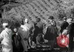 Image of Guide with visitors at a farm Morocco North Africa, 1942, second 33 stock footage video 65675067421
