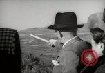 Image of Guide with visitors at a farm Morocco North Africa, 1942, second 49 stock footage video 65675067421