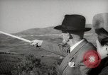 Image of Guide with visitors at a farm Morocco North Africa, 1942, second 53 stock footage video 65675067421