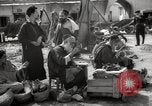 Image of People at work in marketplaces of Marrakech Morocco North Africa, 1942, second 38 stock footage video 65675067431
