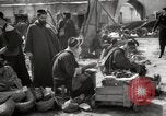 Image of People at work in marketplaces of Marrakech Morocco North Africa, 1942, second 42 stock footage video 65675067431