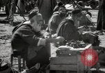 Image of People at work in marketplaces of Marrakech Morocco North Africa, 1942, second 44 stock footage video 65675067431