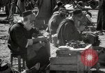 Image of People at work in marketplaces of Marrakech Morocco North Africa, 1942, second 45 stock footage video 65675067431