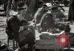 Image of People at work in marketplaces of Marrakech Morocco North Africa, 1942, second 46 stock footage video 65675067431